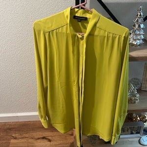 Tie front button down blouse, material is polyester
